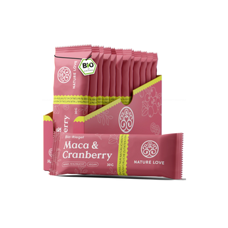 Ein Display mit Nature Love Bio-Riegel in rosa Verpackung und BIO-Siegel bietet einen veganen Snack reich an natürlichem Fruchtzucker.
