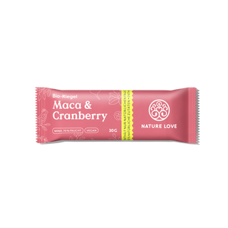 Eine rosa Verpackung umhüllt einen 30g Bio-Riegel von Nature Love, der als vegan gekennzeichnet und mit Hanfprotein sowie Maca & Cranberry für einen natürlichen Energieschub angereichert ist.