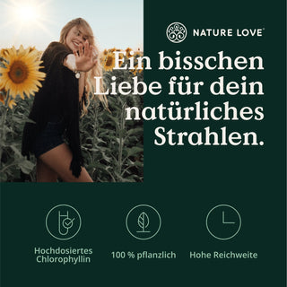 Eine vegane Frau steht auf einem Feld mit Sonnenblumen im Hintergrund, umgeben von Chlorophylltropfen von Nature Love.