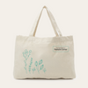 Der Jutebeutel "Nature Love" ist eine beigefarbene Tragetasche aus Segeltuch mit grünen Pflanzenillustrationen und einem Etikett mit der Aufschrift "This bag belongs to a Nature Lover".