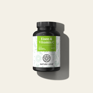 Eine Dose Nature Love Eisen & Vitamin C Tabletten auf weißem Hintergrund.