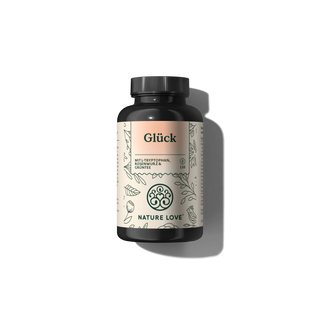 Eine schwarze Flasche mit der Aufschrift „Glück Kapseln“ zeigt detaillierte botanische Designs und den Schriftzug „Nature Love“ auf dunklem Hintergrund und suggeriert einen beruhigenden Aufguss aus Grünteeextrakt.
