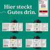 Das Nature Love Happy-Balance-Set zeigt vier Nahrungsergänzungsflaschen mit ihren Nährwertkennzeichnungen, einer Qualitätsauszeichnungsplakette und dem Satz "Hier steckt Gutes drin".