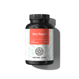 Eine schwarze Flasche "Hey Papa® Kapseln" von Nature Love mit rot-weißem Blumenetikett; sie ist vegan, enthält 120 Kapseln und liefert Vitalstoffe für Fruchtbarkeit.