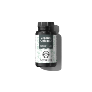 Eine Flasche veganer Omega-3-Kapseln auf schwarzem Hintergrund.