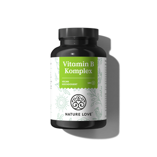 Eine schwarze Flasche mit der Aufschrift "Vitamin B Komplex Kapseln" von Nature Love mit grünem und weißem Design, die 180 vegane, hochdosierte Kapseln für eine optimale Bioverfügbarkeit der B-Vitamine enthält.